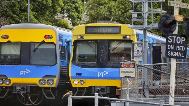 Two trains on the Craigieburn Line at Kensington Station. Picture: Hamish Blair