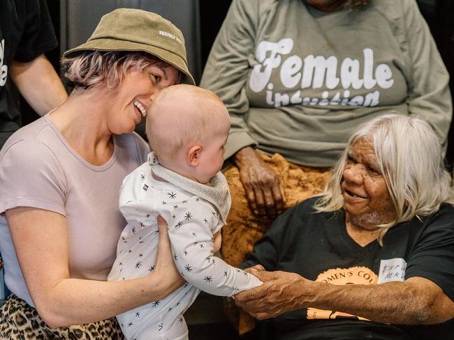 Tinpulya (R), a Ngangkari (Cultural Healer), offers guidance to others in the University of Western Australia's program to prevent indigenous suicide. Picture: Asher Lilley