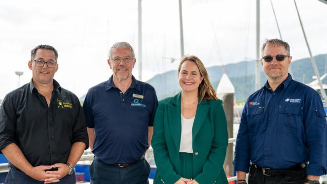 Gareth Phillips, Doug Baird, Nita Green and Reef Authority Chief Scientist Roger Beeden at the Cairns Reef Fleet plaza on Monday. Picture Emily Barker.