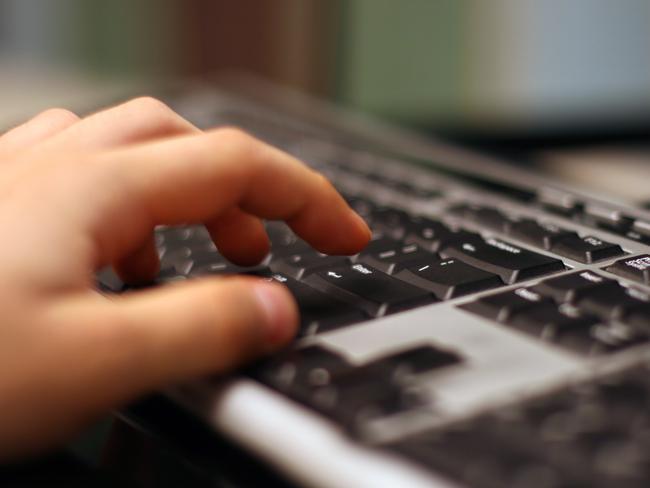 Generic photo of hand using keyboard for Escape brief - Supplied