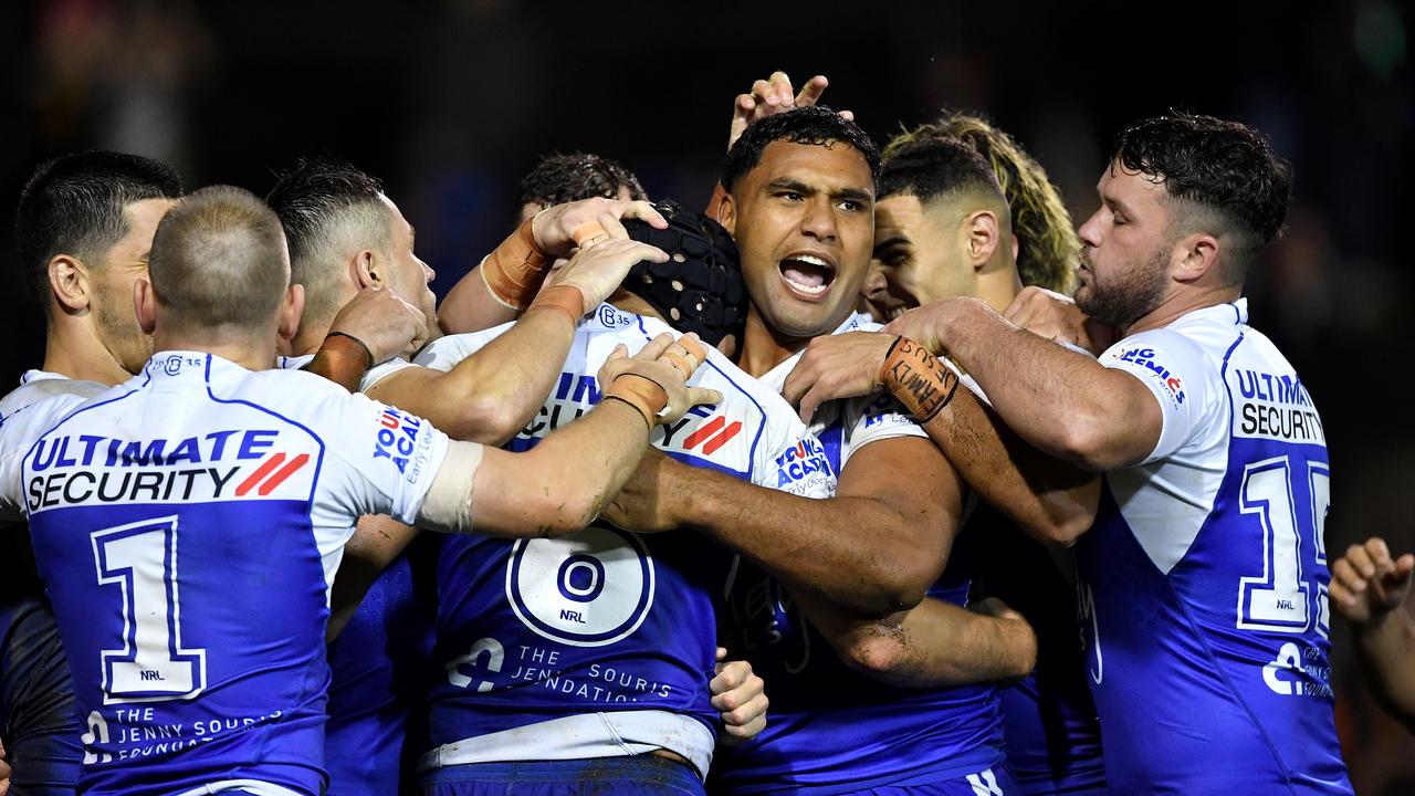 Bulldogs teammates celebrate Matt Burton’s try in the second half. Picture: NRL Photos