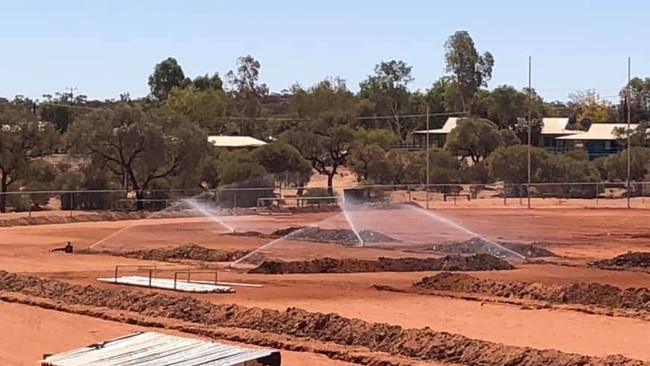 Resurfacing the oval with grass in Central Australia was always going to be a challenge. Picture: Supplied