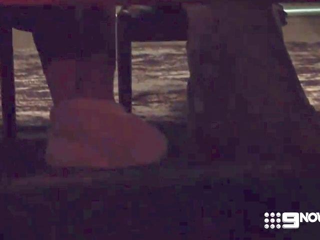 Nine showed grainy footage of Sierah and Adrian's footsie action.