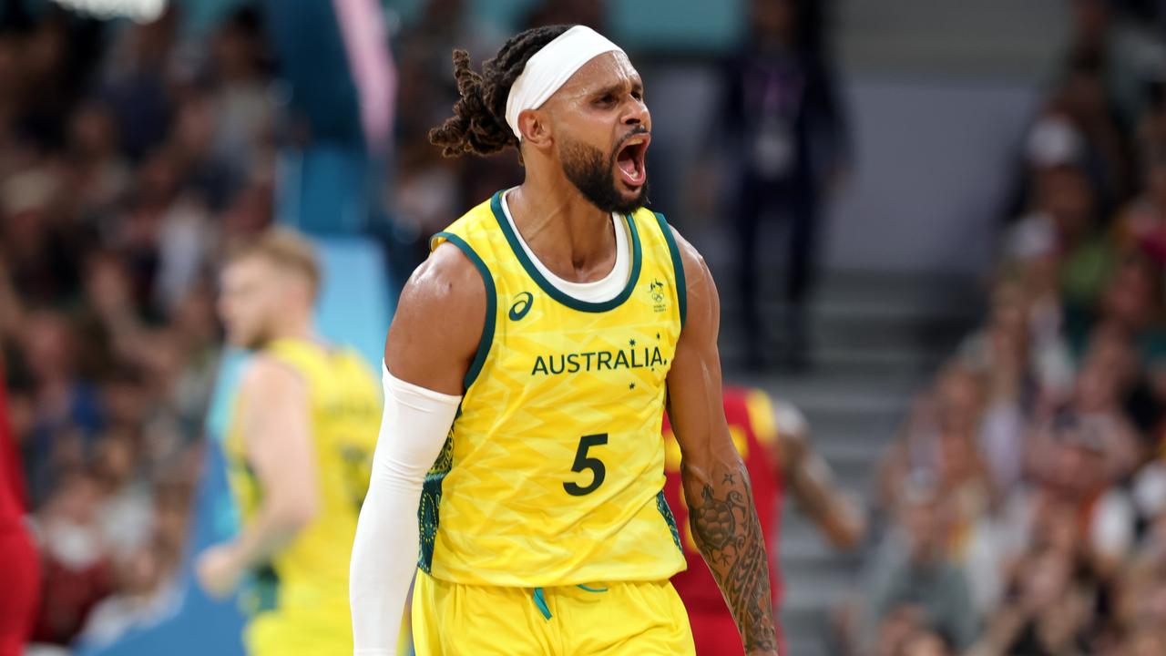 LILLE, FRANCE - JULY 27: Patty Mills of Australia celebrates during the Men's Group Phase - Group A match between Australia and Spain on day one of the Olympic Games Paris 2024 at Stade Pierre Mauroy on July 27, 2024 in Lille, France. (Photo by Christina Pahnke - sampics/Getty Images)