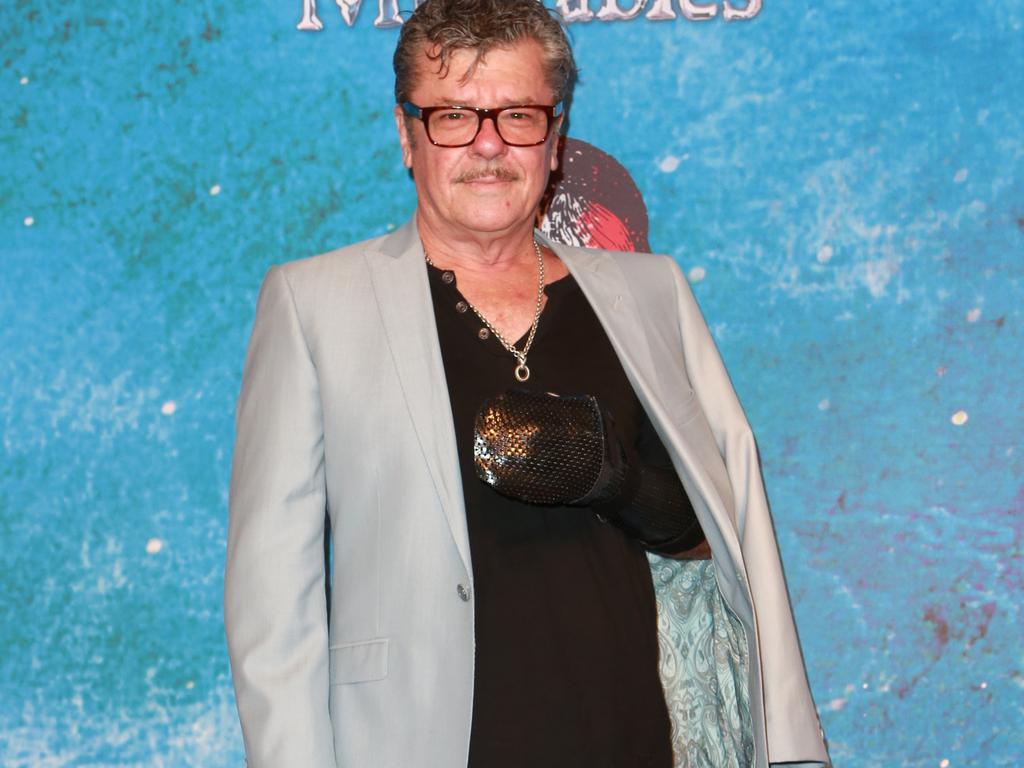 Tim Farriss sporting hand bandages at a premiere in Sydney in 2015. Picture: Christian Gilles