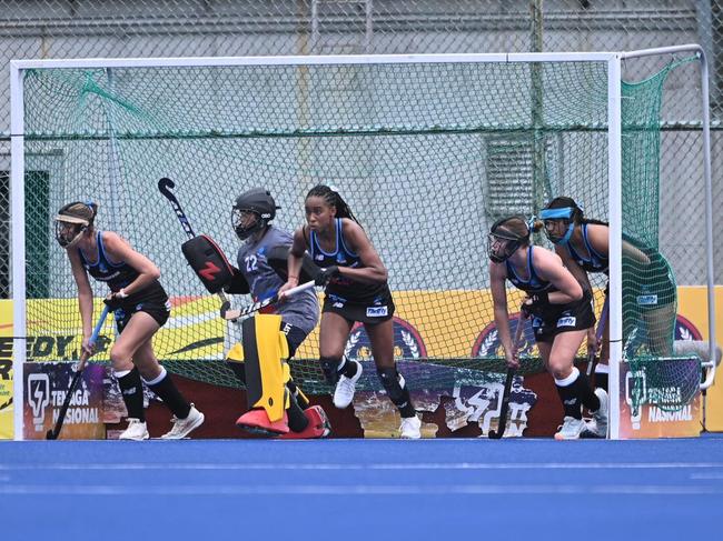 Territory Stingers women lining up in defence in the goal mouth. Picture: Hockey NT / Territory Stingers