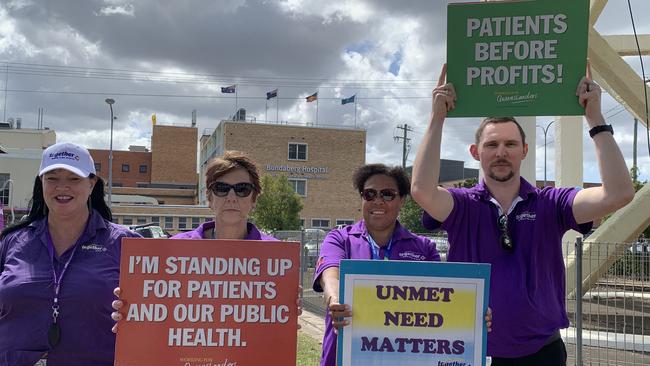 SPEAKING UP: Together lead organiser Allison Finley-Bissett and protesters at the Together Union protest outside the Bundaberg Hospital on Thursday.