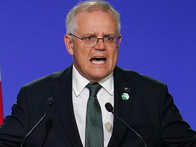 GLASGOW, SCOTLAND - NOVEMBER 01: Scott Morrison, Prime Minister of Australia speaks as National Statements are delivered on day two of the COP 26 United Nations Climate Change Conference at SECC on November 01, 2021 in Glasgow, Scotland. 2021 sees the 26th United Nations Climate Change Conference. The conference will run from 31 October for two weeks, finishing on 12 November. It was meant to take place in 2020 but was delayed due to the Covid-19 pandemic. (Photo by Ian Forsyth/Getty Images)