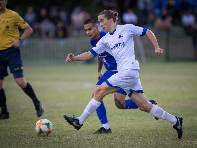 Surfers Paradise Apollo Gold Coast Premier League player Dylan Barwick (white strip) in action against Robins in the semi-final at Lex Bell Oval on Saturday, November 7. Picture credit: East End Digital.