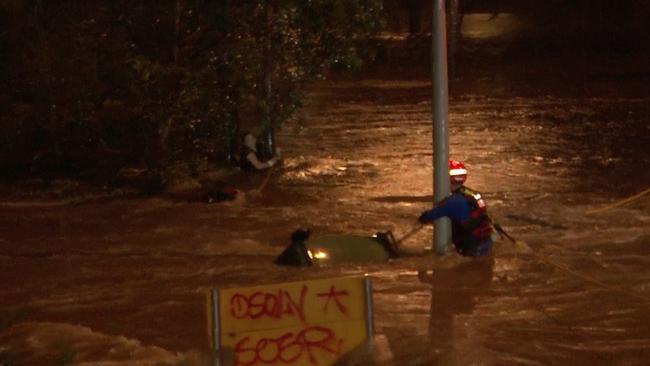 The woman reportedly clung to a tree in floodwaters at Holsworthy before being dramatically rescued by the SES.. Picture: TNV