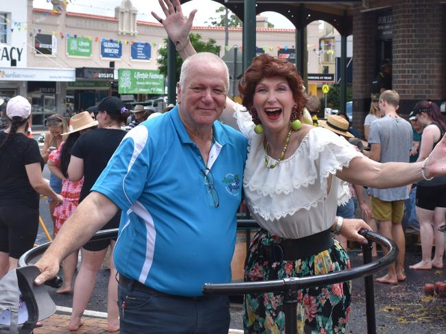 Mayor Vic Pennisi gets into the spirit at the Apple and Grape Festival grape crush, March 1, 2024