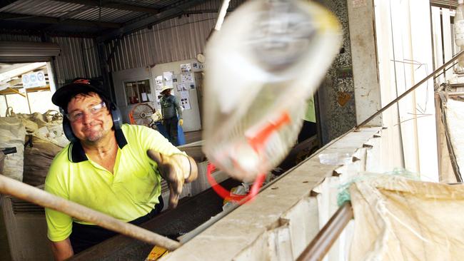 Anuha employee Mark Williams sorts plastics to be recycled at the Anuha recycling facility. Photo: Claudia Baxter (File image)