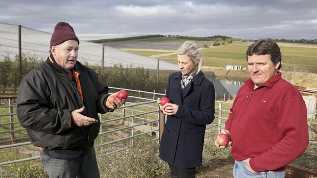 Nikki Roberts, centre, with farmers Malcolm Parker and Jim Franklin-McEvoy. Picture: Dean Martin