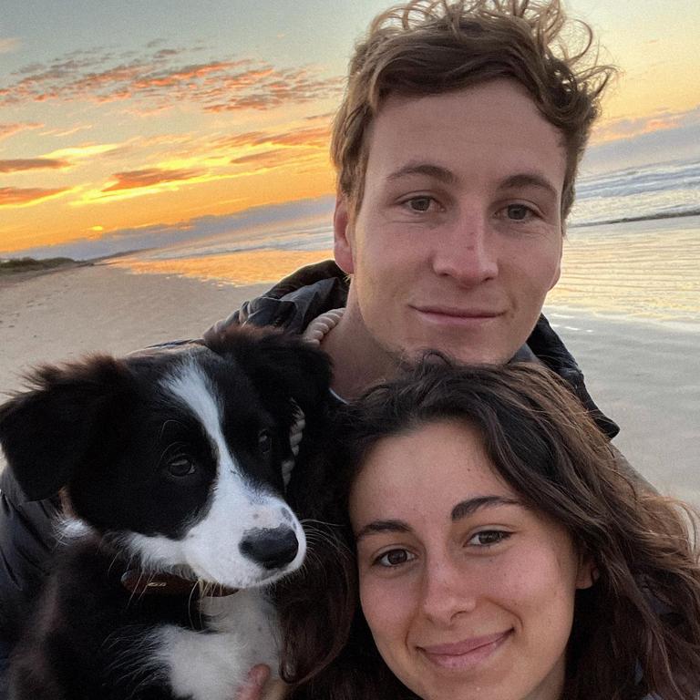 Jordan Dawson with his dog Maggie and partner Millie Dutton. Picture: Instagram