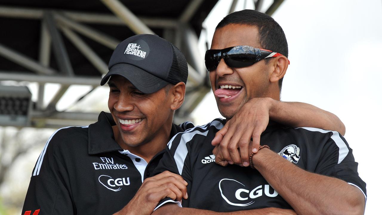 Andrew Krakouer and Leon Davis at a Collingwood fan day during their time at the club.