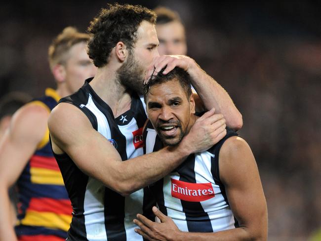 Andrew Krakouer (right) died in March.