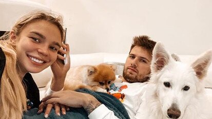 Goltes' posts often feature Doncic and their dogs.