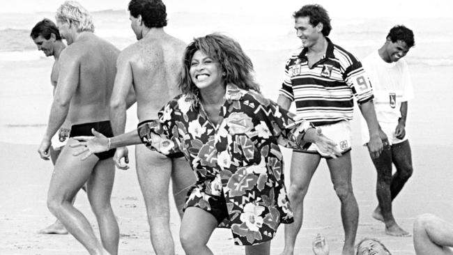 Tina Turner with players during filming of the 'Simply the Best' advertising campaign.