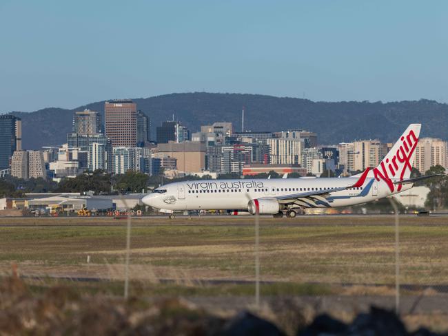 Under the new scheme, airlines would be forced to give passengers refunds for disrupted, cancelled or unreasonably delayed flights. Picture: Ben Clark