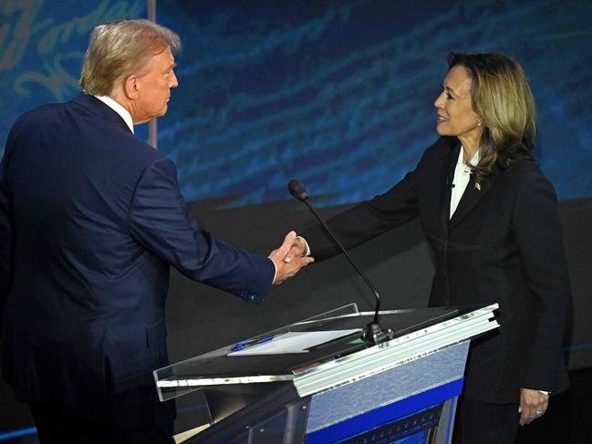 Kamala Harris made a point of introducing herself and shaking Donald Trump’s hand. Picture: AFP