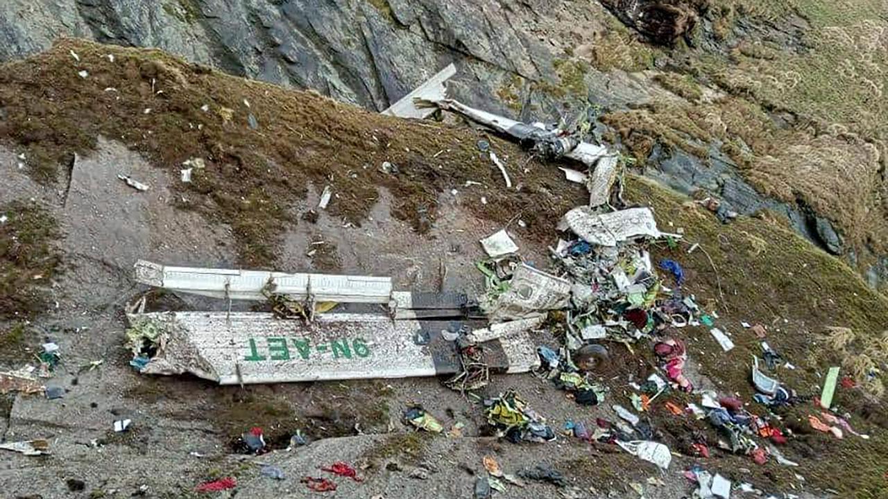 The wreckage of a Twin Otter aircraft, operated by Nepali carrier Tara Air, lay on a mountainside in Mustang on May 30, 2022, a day after it crashed. Picture: Bishal Magar/AFP