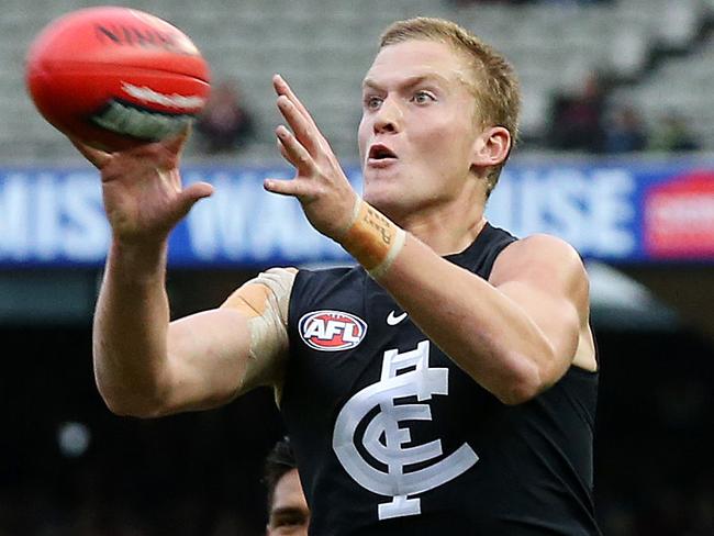 AFL Round 9. 20/05/2018.  Carlton v Melbourne at the MCG.  Carlton debutant Patrick Kerr marks on the lead  . Pic: Michael Klein