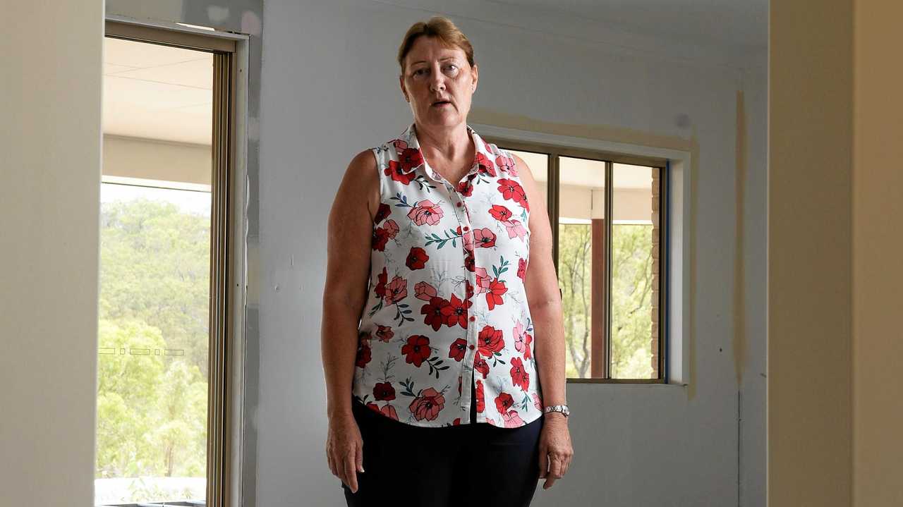 BROKE: Peggy Kendall's Mount Alford home remains a shell after G.J Gardner at North Ipswich went bust. Picture: Rob Williams