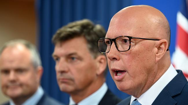 Peter Dutton in Brisbane with Angus Taylor and Ted O'Brien pushing the Coalition’s approach to energy which integrates zero-emissions nuclear energy alongside renewables and gas. Picture: NewsWire / John Gass