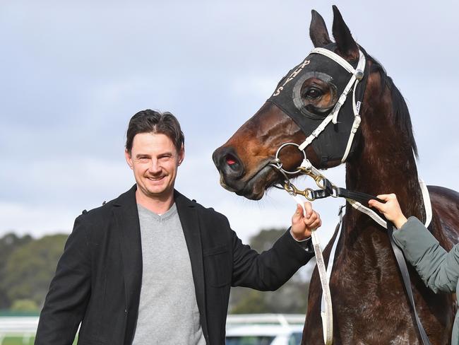 Rhys Archard with Boltsaver after winning the Sportsbet Jockey Watch Handicap at Sportsbet Sandown Lakeside Racecourse on July 17, 2024 in Springvale, Australia. (Photo by Pat Scala/Racing Photos via Getty Images)