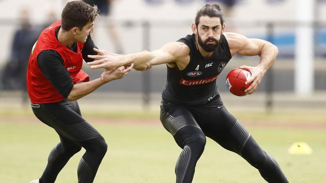 Brodie Grundy (right) will go back-to-back as the No. 1 SuperCoach ruckman. Picture: AAP Image/Daniel Pockett.