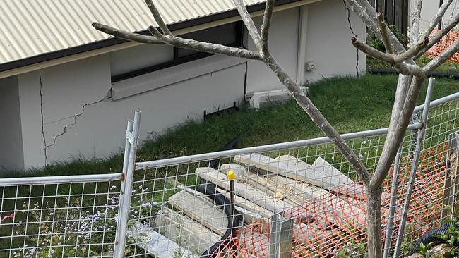 Cracks on the back wall of a home at Riverstone Crossing at Maudsland after a landslip.