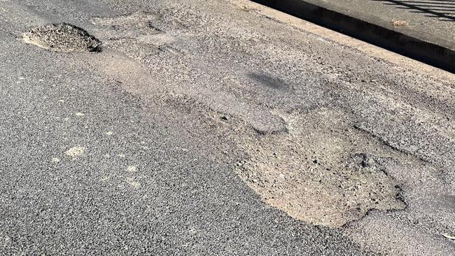 Craters at Woolgoolga have developed on the back of a string of severe storms. Picture: Chris Knight