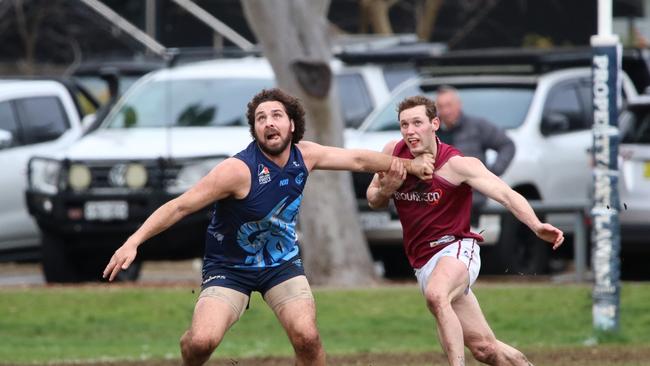 Glenunga superstar Abe Davis battles Prince Alfred's Mackenzie Slee. Picture: Max Stapleton