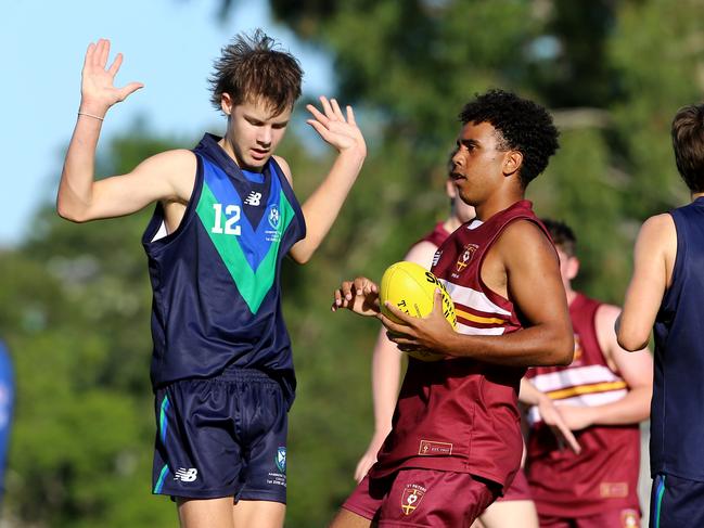 AIC AFL seniors match between Ambrose Treacy College and St Peters Lutheran College (Maroon top)  Friday 10th February 2023 Picture David Clark