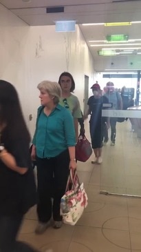 Passengers arrive into the terminal at Hobart International Airport