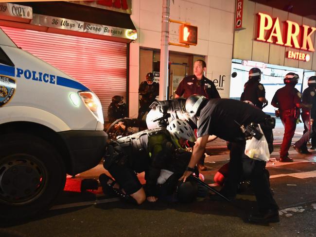 NY police make arrests after reports of looting. Picture: AFP