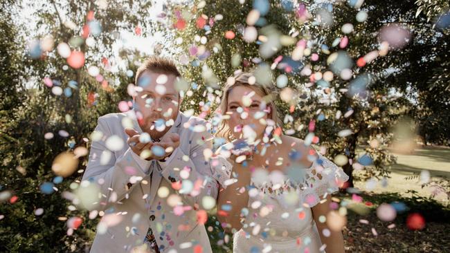 Couples are making photos fun with props and plenty of personality. Photo: Ginger + Mint