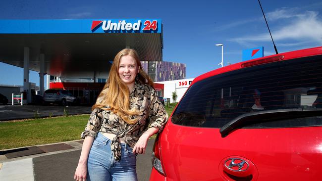 Caitlin Smollett at United Woolloongabba, which charged 84.9 cents per litre in April 2020. Today, they are charging 169.7 cents per litre. Picture: Adam Head