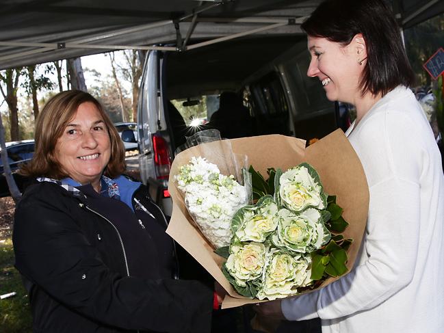 LIVERPOOL LEADER/AAP.  Kathleen Padovano from Jonima flowers at the Liverpool Growers and foodies market in Chipping Norton on Saturday  15 June, 2019.  The council is launching its Love Liverpool campaign today at the Liverpool Growers and Foodies Market. (AAP IMAGE / Carmela Roche)