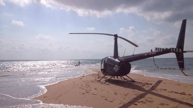 Helibrook chopper VH-MEB on a Northern Territory beach before it went underwater