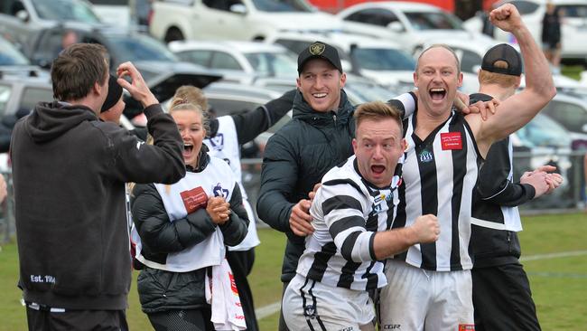 The Narre Warren bench celebrate on the final siren. Picture: Josie Hayden