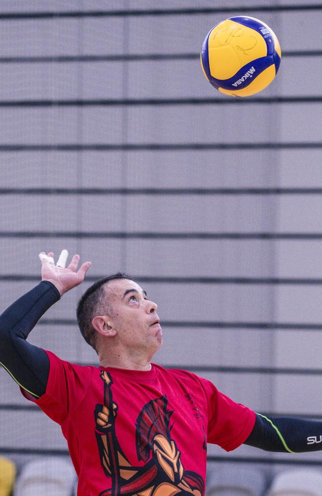 Action as Sparta v the Crippled Wombats in the Pan Pacific Masters Games Volleyball tournament. Picture: Glenn Campbell