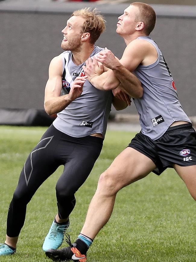 Jack Hombsch, who returns to the Power side, contests with Tom Clurey at training on Wednesday. Picture Sarah Reed