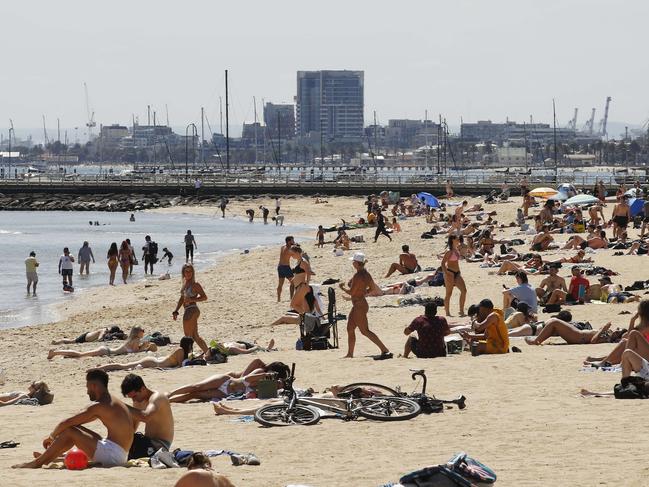 MELBOURNE, AUSTRALIA - NCA NewsWire Photos November 9, 2020:   People enjoy the weather at St Kilda beach in Melbourne, Victoria. Picture: NCA NewsWire / Daniel Pockett