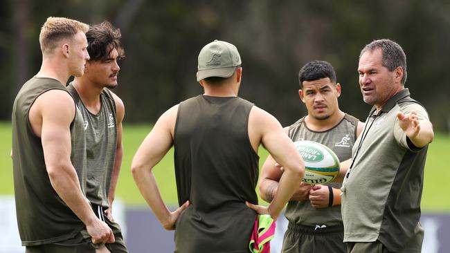 Wallabies head coach Dave Rennie talks to his backline during the 2020 Test season. Photo: Getty Images