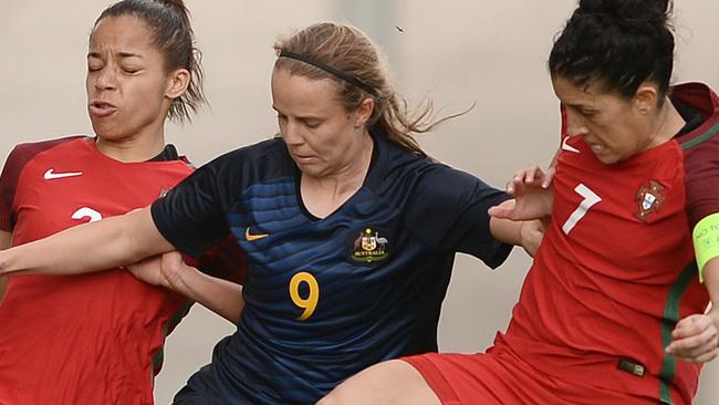 Claudia Neto (R) of Portugal competes for the ball with Emily Condon in her debut for the Australian team.