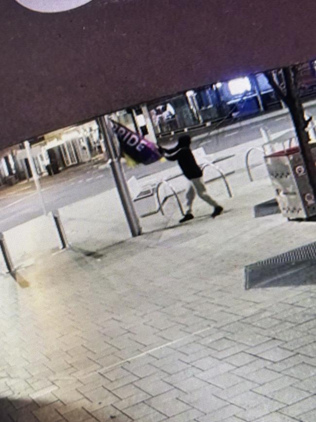 Vandal strikes rainbow LGBTQIA+ flag in Launceston during Pride Month. Picture: Supplied CCTV