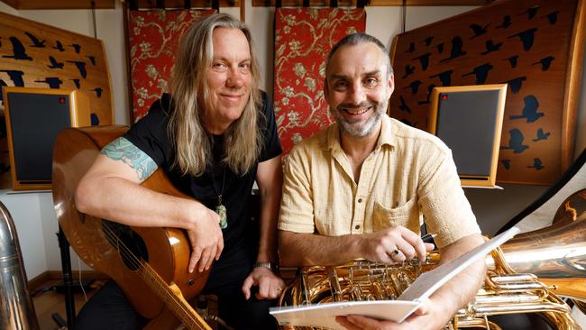 Violent Femmes bass player Brian Ritchie and Tasmanian Symphony Orchestra’s principal tuba player Tim Jones. Picture: Peter Mathew.