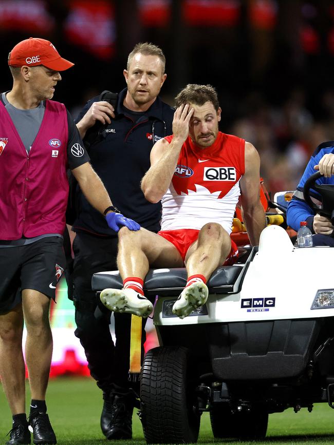 Sydney's Harry Cunningham was stretchered after a hit from Peter Wright. Picture: Phil Hillyard.