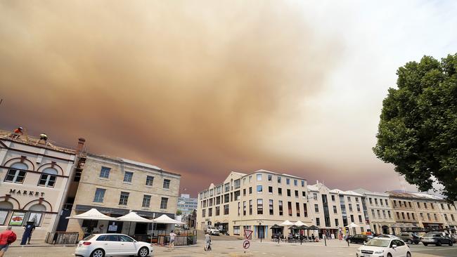 Smoke in Hobart rises above Salamanca from today’s bushfires. Picture: RICHARD JUPE